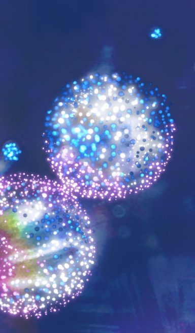 Esferas brillantes de colores azules y morados, con destellos en un fondo oscuro.